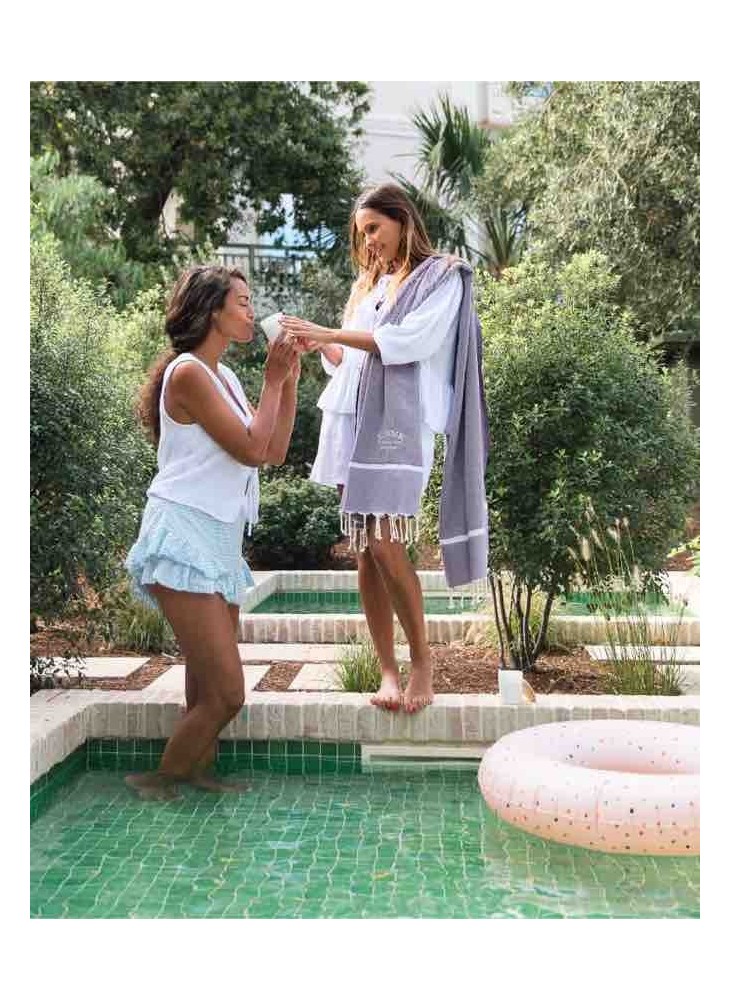 Bougie en pot blanc, chic et intemporelle. Parfumeur français. Les bains d'Arcachon.