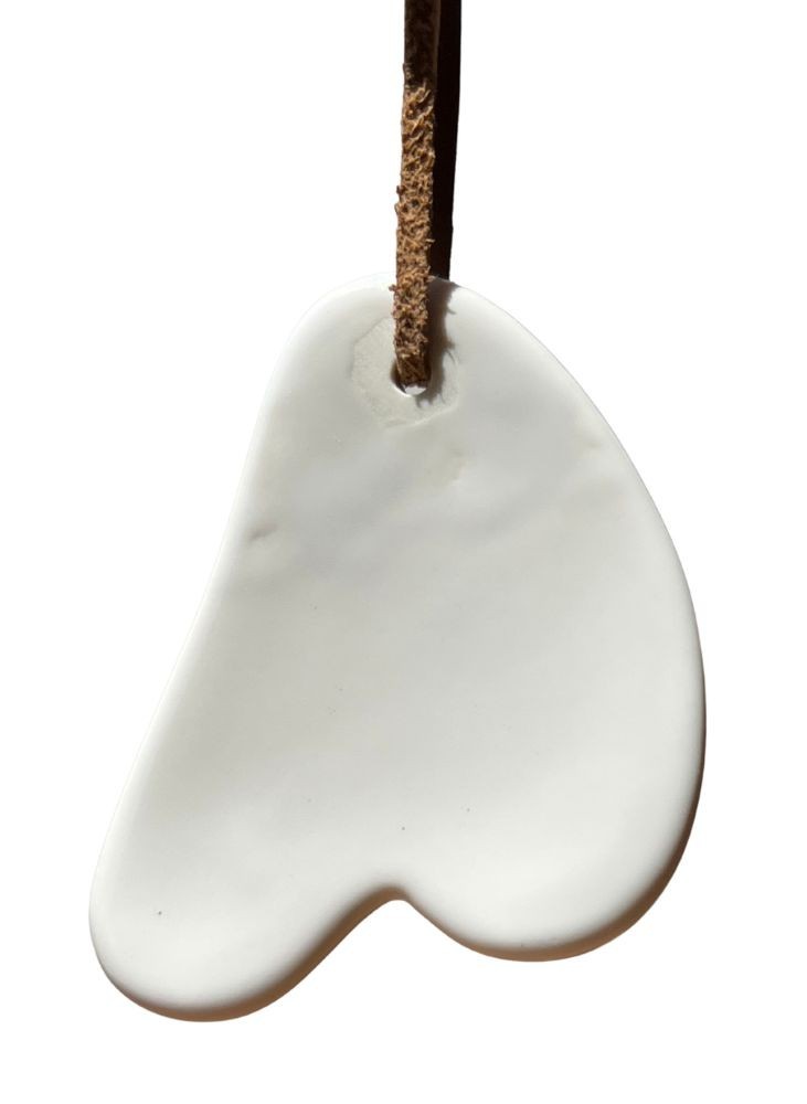 accessoire de massage du visage fait à la main en porcelaine de Limoges. accessoire de massage du visage fait à la main en porcelaine de Limoges.