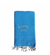 Fouta unie bleu piscine. Brodée Écume d'Arcachon.