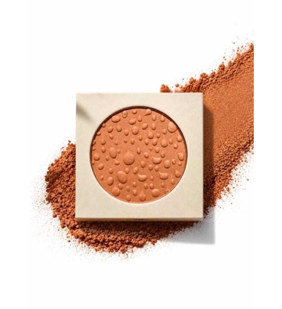 Poudre cuivre pour le visage. Ne marque pas les traits.