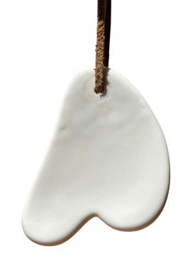 accessoire de massage du visage fait à la main en porcelaine de Limoges.